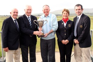 John Moloughney, Chairman Munster Branch GUI presenting the Munster Seniors Open trophy to Tom Cleary (Cork GC) at Waterville Links.  Also included are Waterville Officers James Sugrue, President; Bride O'Brien Lady Captain; and John O'Neill Captain. Picture: Niall O'Shea